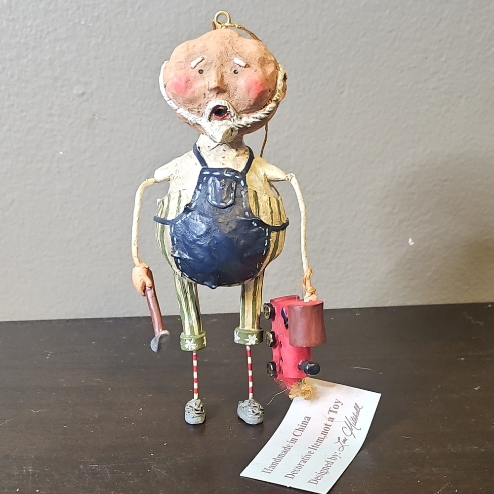 Handcrafted Artisan Figurine with Tools